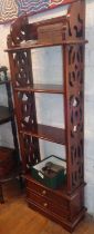 Mahogany shelving unit with drawers under