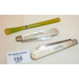Art Deco green catalin long cigarette holder and two antique mother of pearl cased fruit or pen