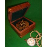 Brass sundial in box (A/F) with map measurer