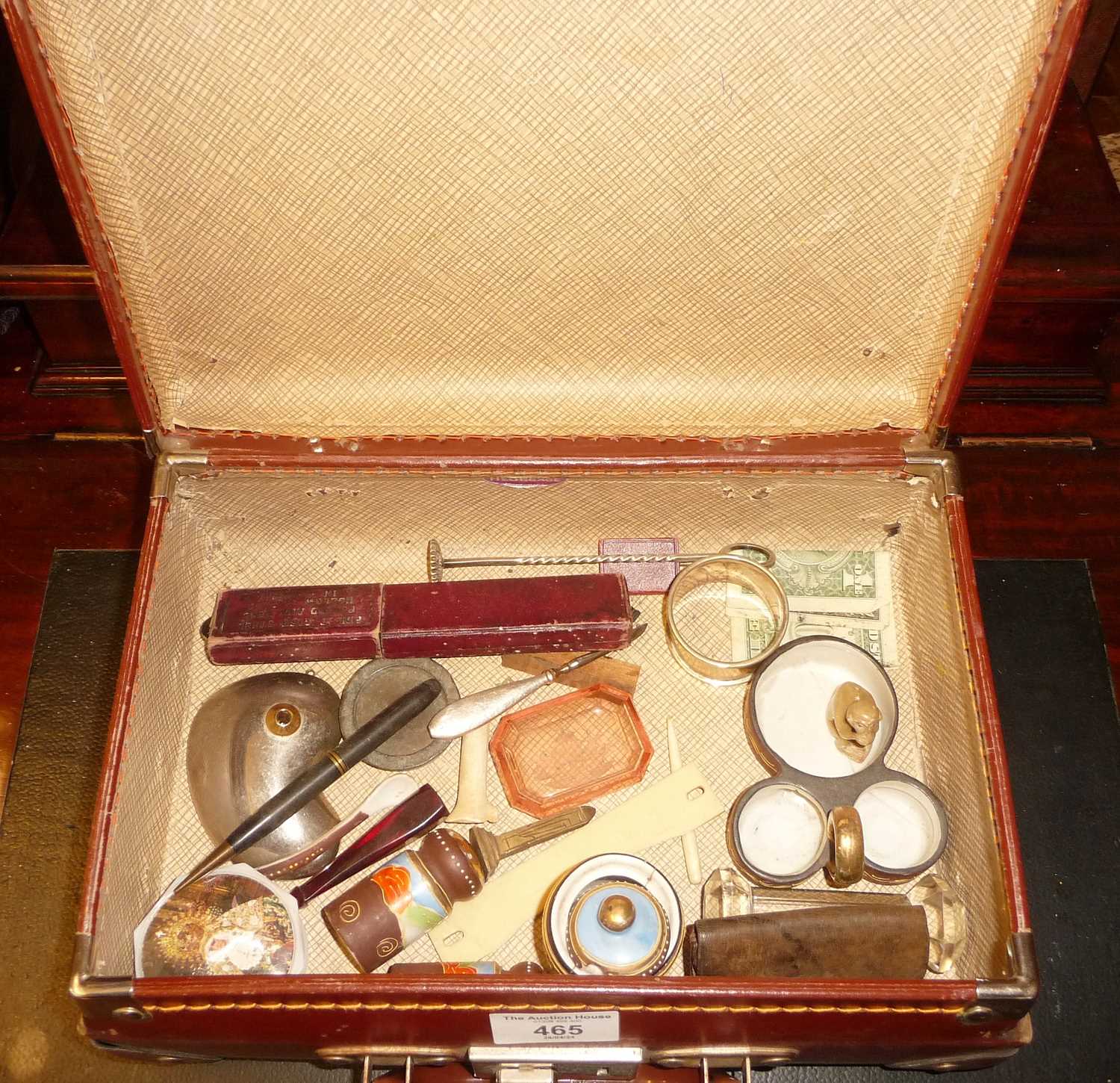 Small suitcase and contents, inc. razor, glass and china, etc.