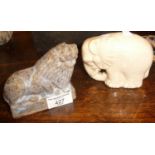 Small glazed stoneware figure of a lion by A.H. Gerrard of Millbank Pottery and a crackle white