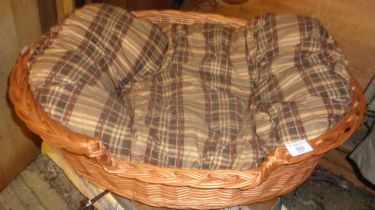 Wicker dog basket with cushion