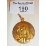18ct gold religious medallion showing the Virgin Mary, marked as 750, approx. weight 10.5g