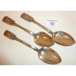 Three Russian silver dessert spoons, with ornate niello enamel and engraved decoration. Maker's mark
