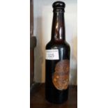 Old bottle of Guinness, uncorked