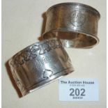 Arts and Crafts silver napkin ring, hallmarked for Sheffield 1904, Lee & Wigfull and another,