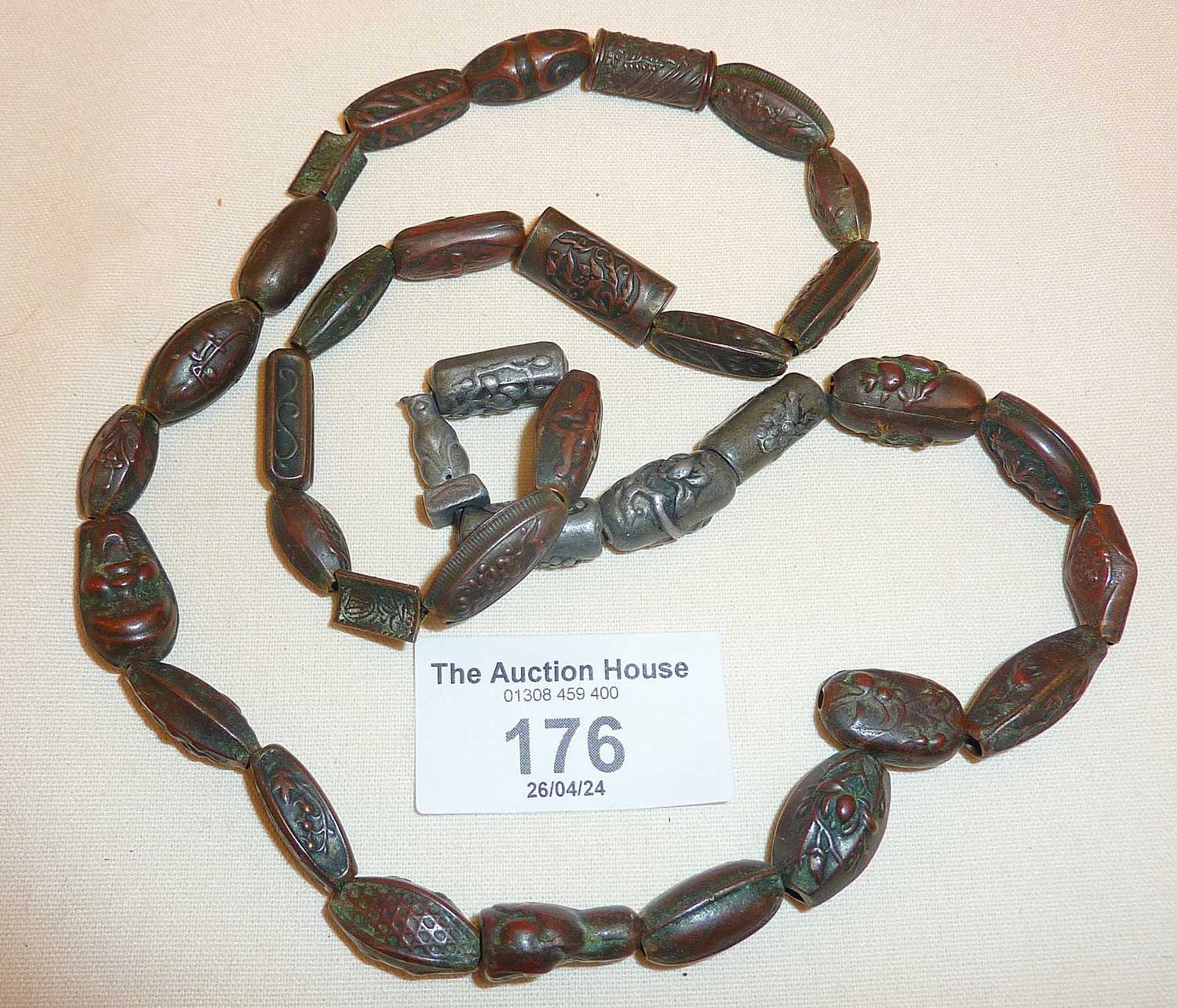 String of 36 Japanese Meiji Ojime metal beads, some bronze