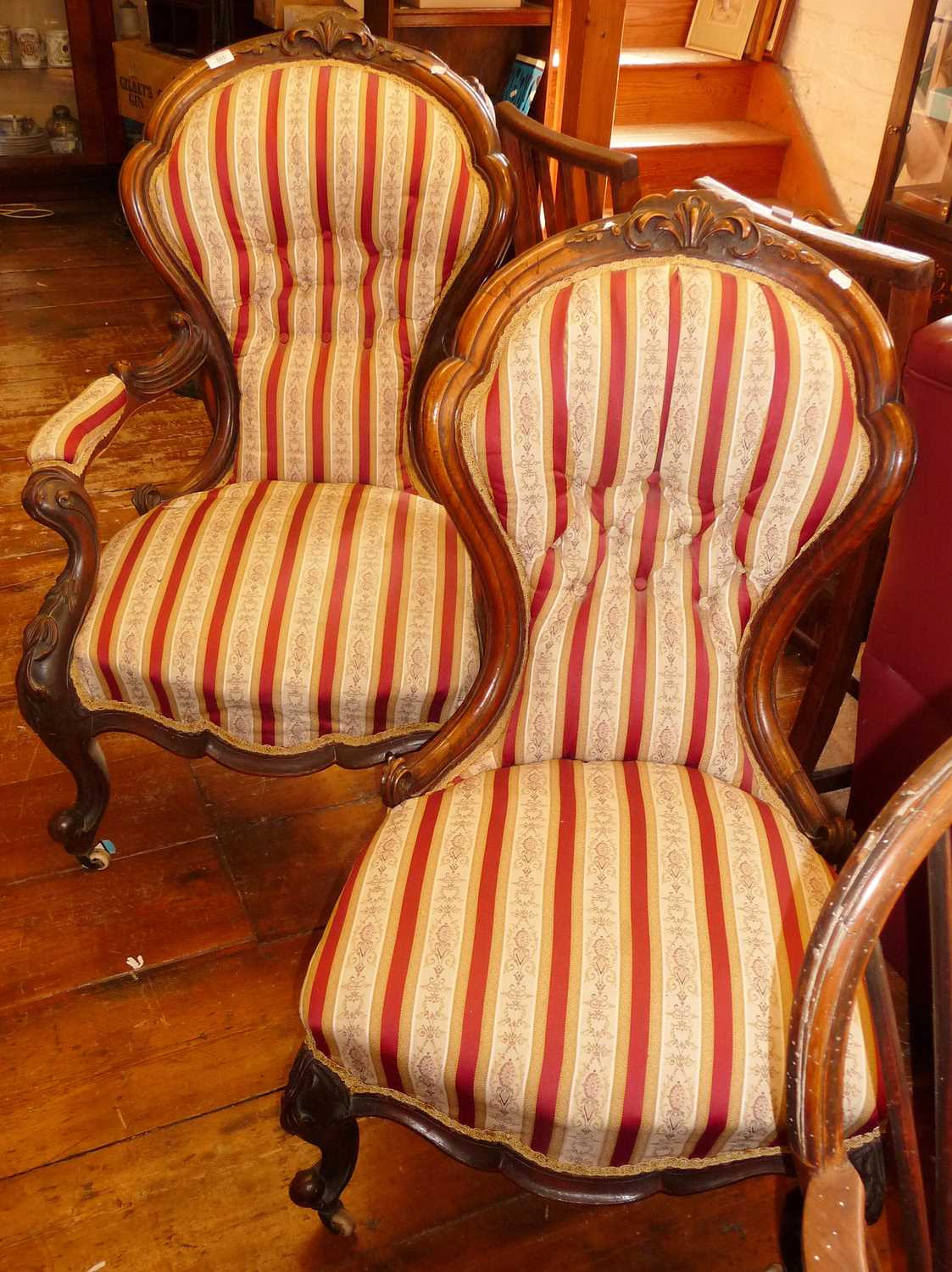 19th c. carved walnut gentleman's spoonback open armchair with padded back on cabriole legs together
