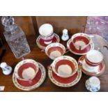 Wedgwood soup bowls and saucers, cups and saucers and a Crown Staffordshire cruet