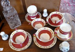 Wedgwood soup bowls and saucers, cups and saucers and a Crown Staffordshire cruet