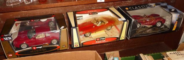 Two boxed Burago diescast sports cars and a Classico collection Ferrari
