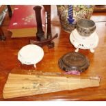 Four Chinese hardwood stands, a pewter mounted bowl with dragons and a wooden fan