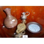 South American white metal or silver mate vessels, a Romanesque bronze spirit lamp, a Studio Pottery