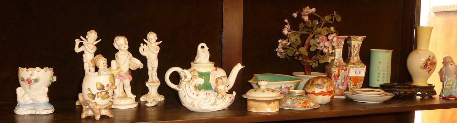 Oriental china items (many A/F), and some porcelain cherubs (one shelf)