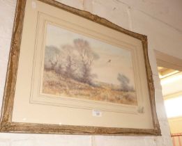 Watercolour of a rural landscape with pheasant in flight, signed Trevor, 19" x 25" including frame