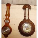Carved banjo-shaped barometer, and another