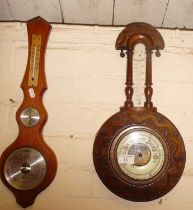 Carved banjo-shaped barometer, and another