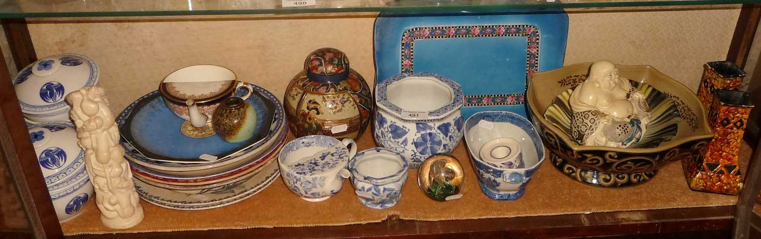 Blue and white china, resin buddha, plates, etc. (one shelf)