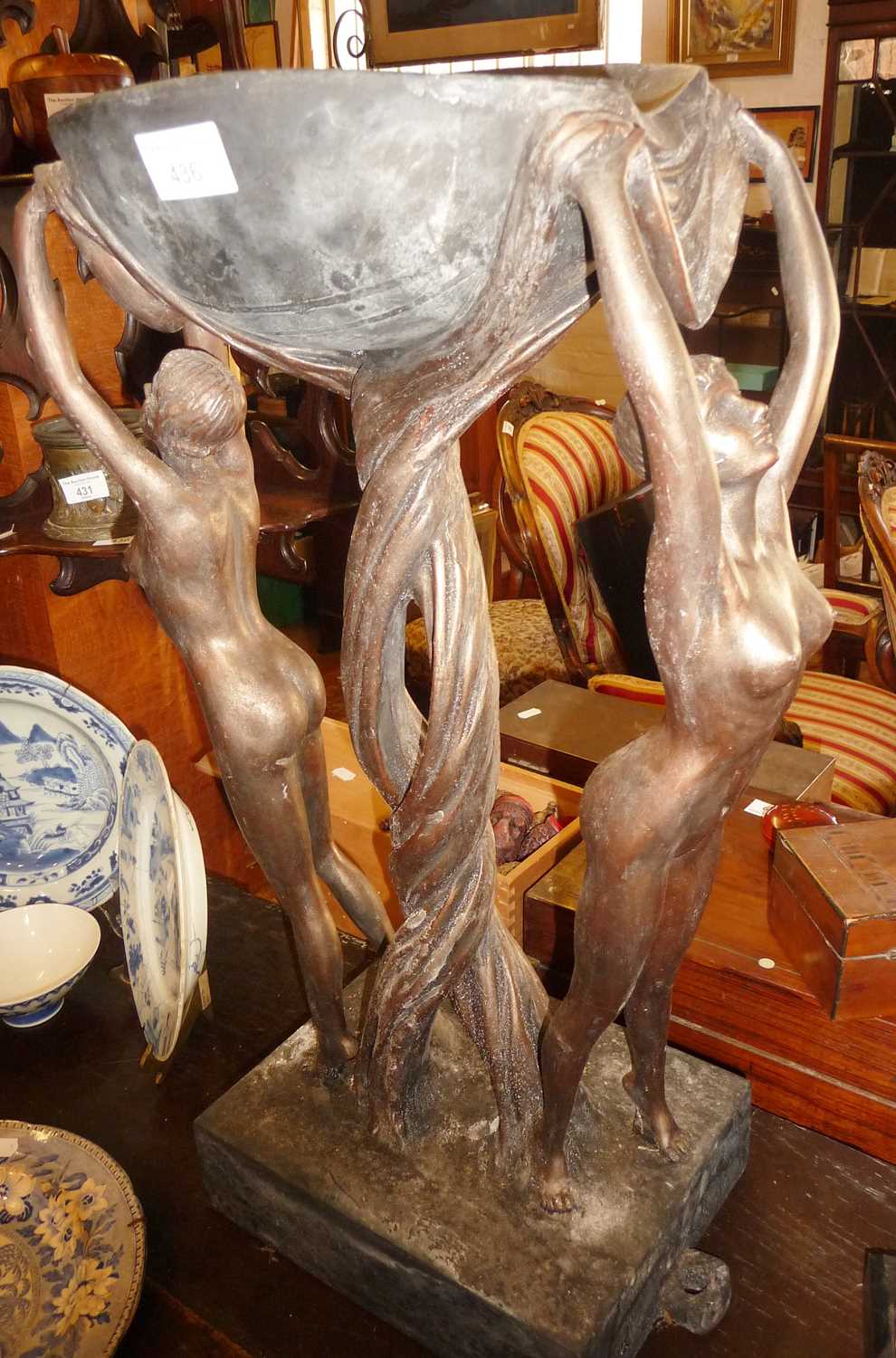 Tall Art Deco style resin sculpture of two nude ladies holding a bowl