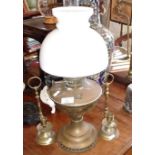 Brass oil lamp and two brass chambersticks