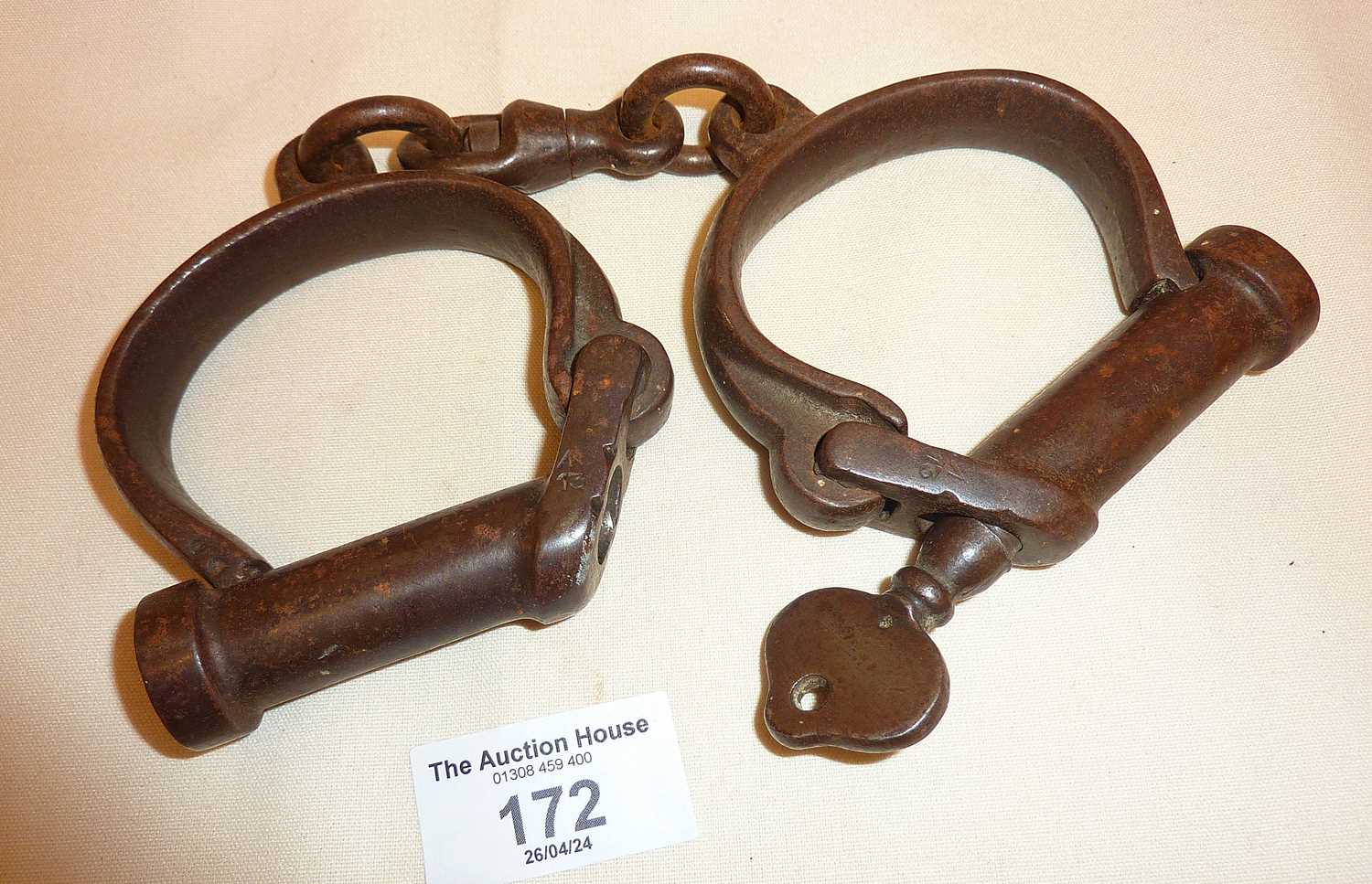 WW2 British military or police handcuffs stamped with broad arrow and dated 1941 (with original key)