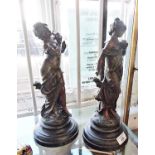 Pair of Art Nouveau painted spelter figures, 'Le Nid' and 'Message' after L. Moreau, 14" tall