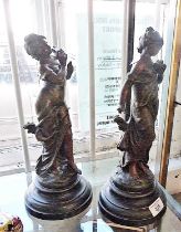 Pair of Art Nouveau painted spelter figures, 'Le Nid' and 'Message' after L. Moreau, 14" tall
