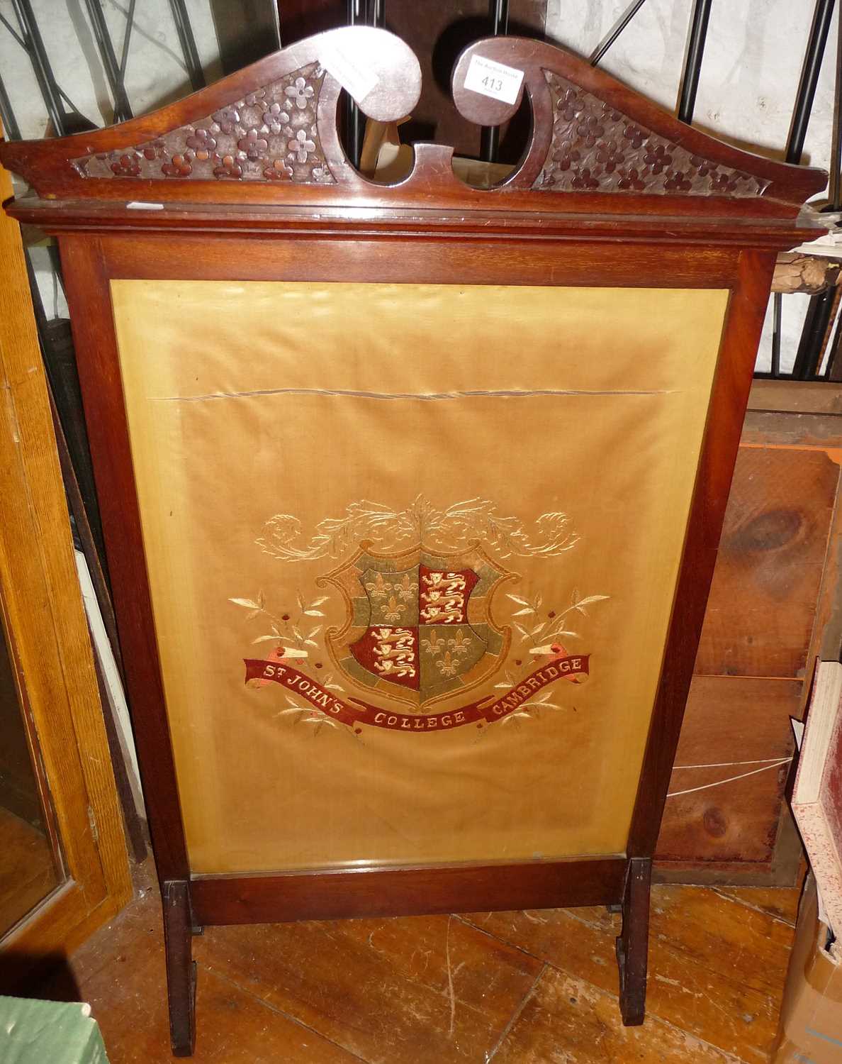 Victorian carved mahogany firescreen with inset embroidered panel "St John's College Cambridge"