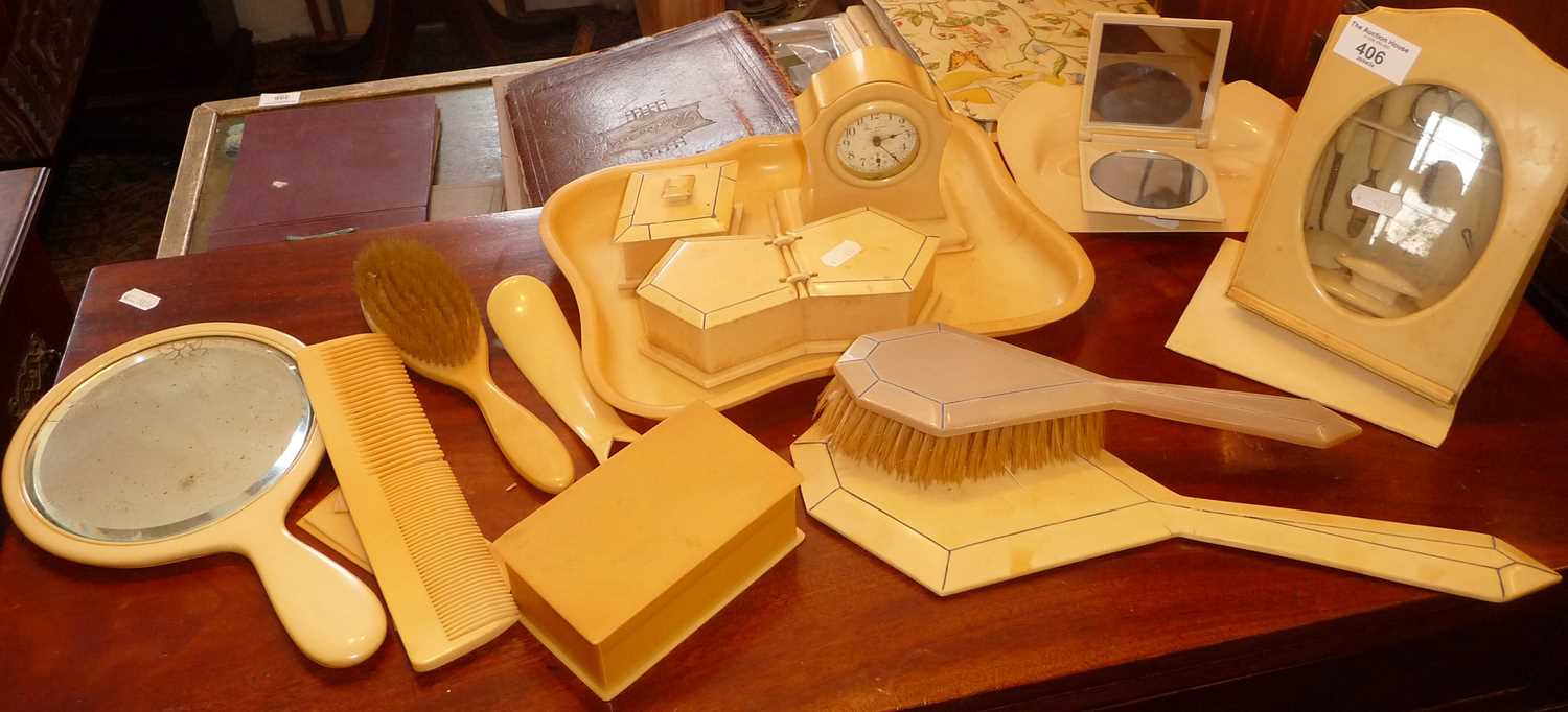 Art Deco celluloid vanity items for dressing table, inc. a clock, photo frame with integral manicure