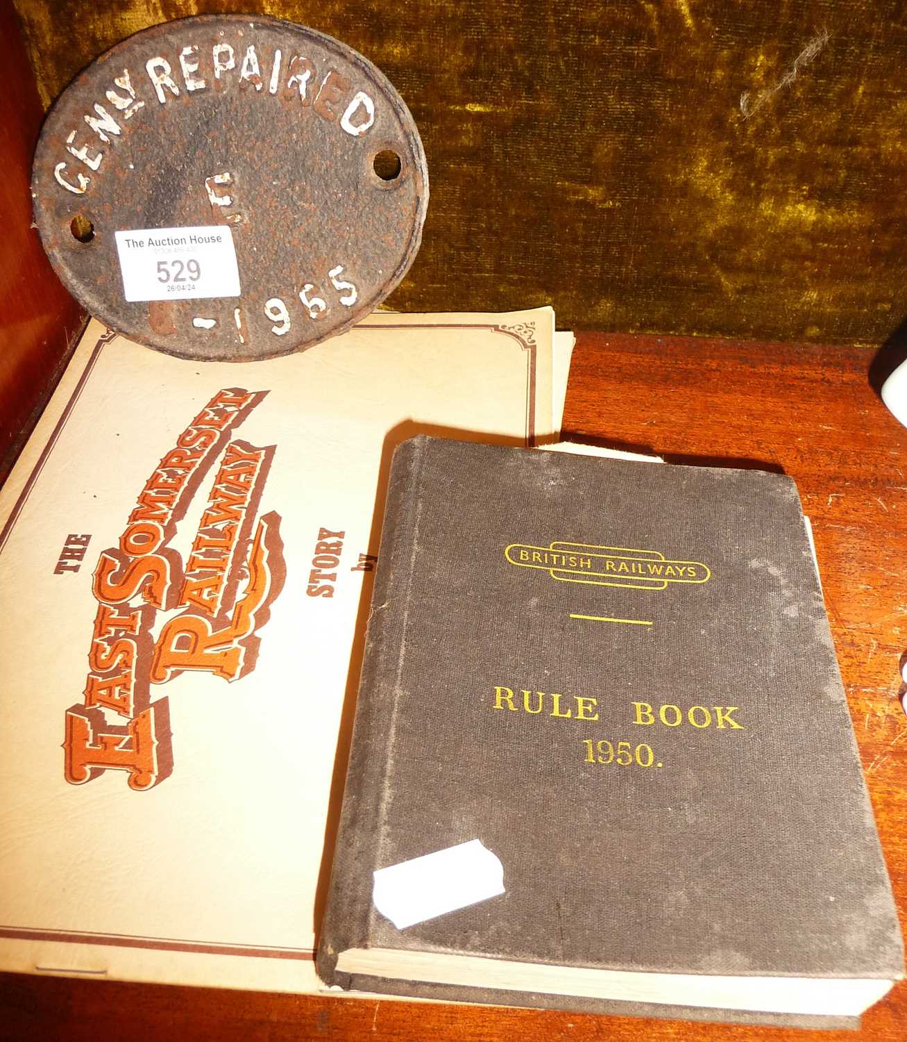 British Railways rule book, cast iron wagon plate and some David Shepherd booklets relating to the