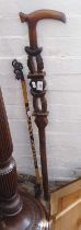 Tribal Art - carved wooden walking stick, with an oriental decorative bamboo cane