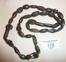 String of 37 Japanese Meiji Ojime beads, most bronze