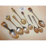 925 and lower grade silver and enamel spoons (combined weight approx. 83g), together with a silver