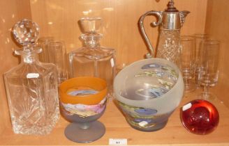 Two cut glass decanters, a claret jug and other glassware