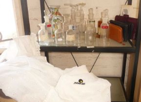 Quantity of chemistry bottles, 8 leather purses and a tennis dress, size 12