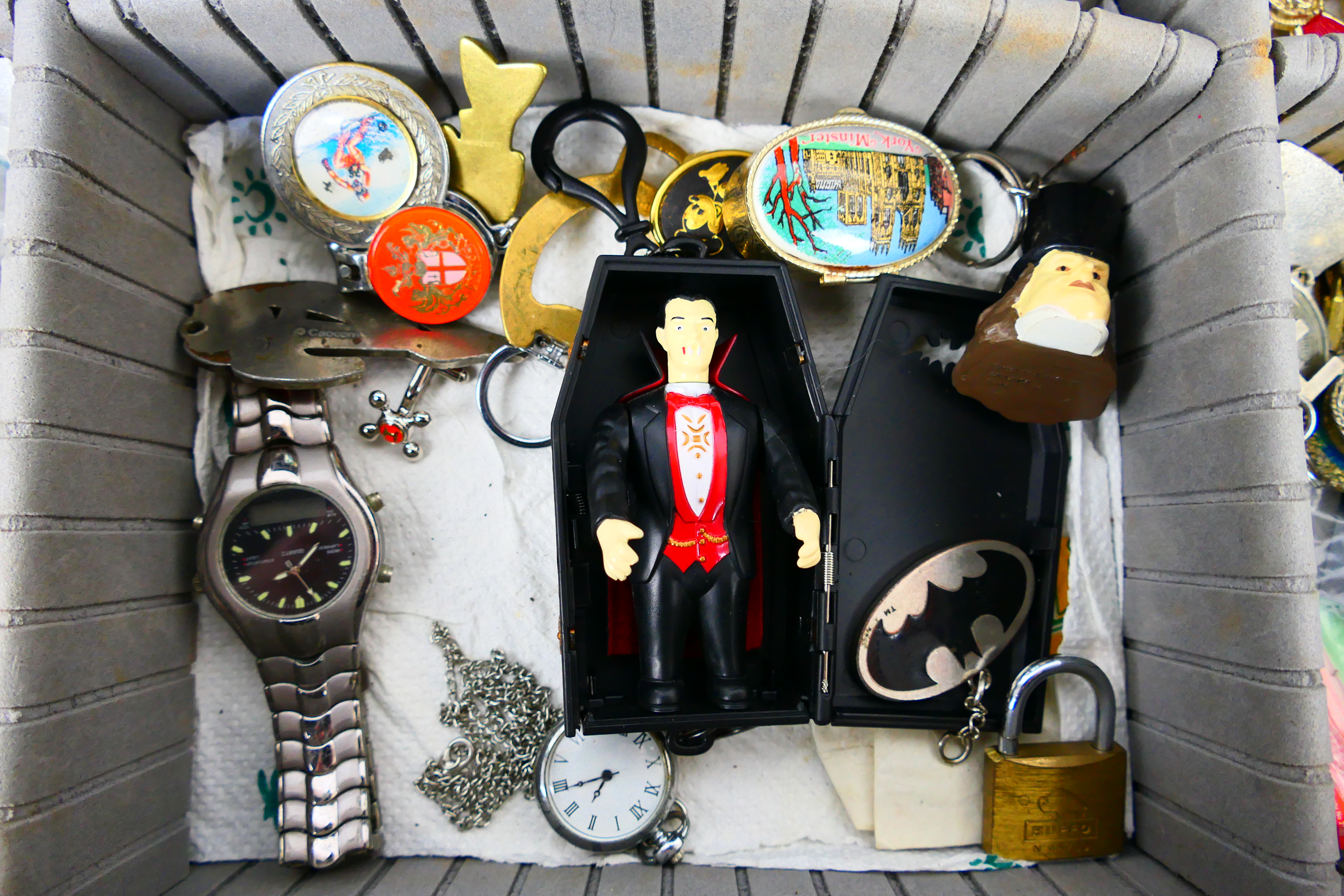 An aluminium case containing mixed collectables to include watches, sunglasses, belt buckles, - Image 2 of 8