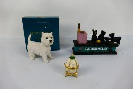 Lot to include a cast iron money bank, Leonardo Collection model from the Dog Studies collection,