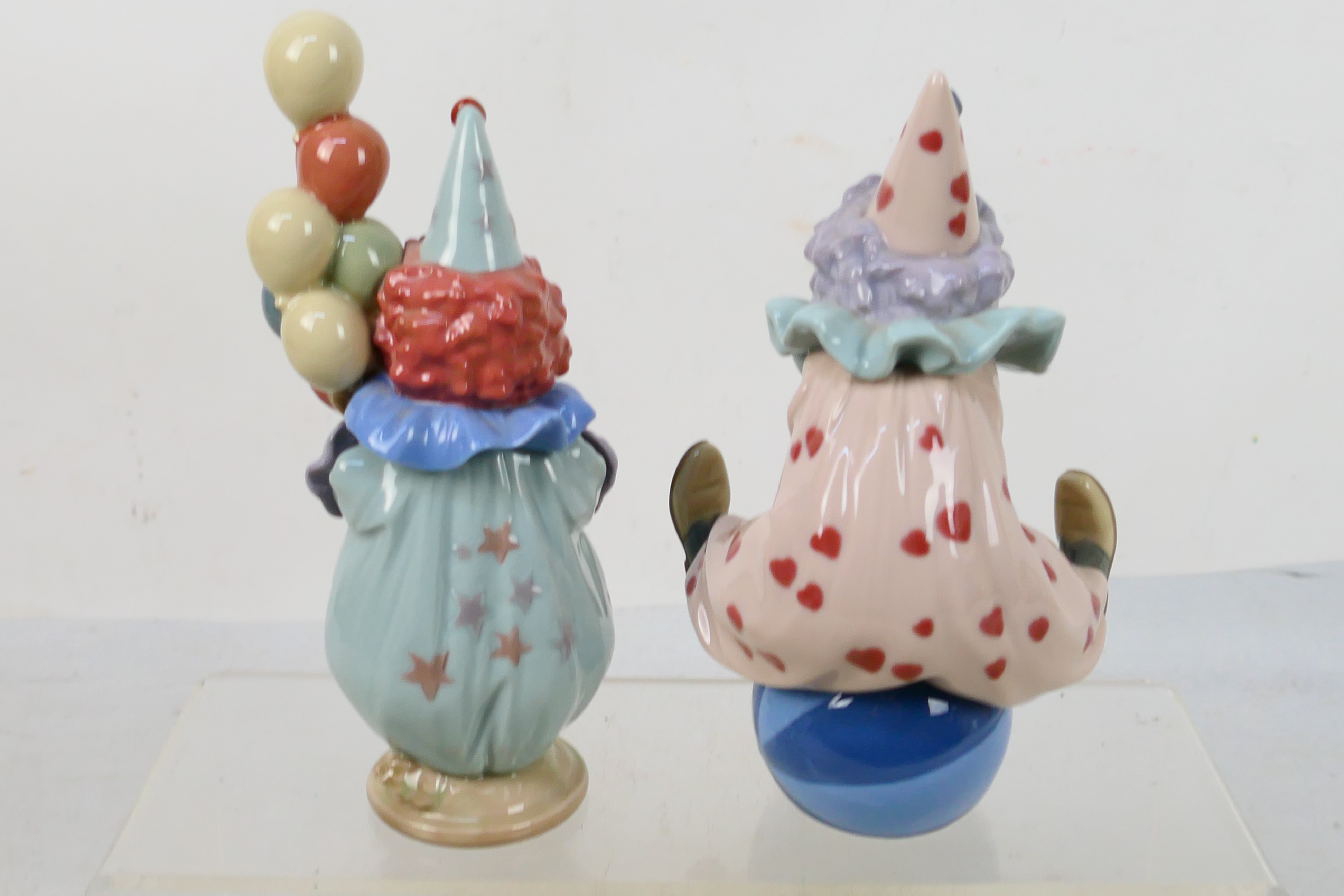 Two Lladro figures depicting young clowns comprising # 5813 Having A Ball and # 5811 Littlest Clown, - Image 2 of 4