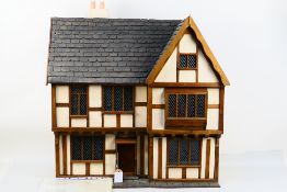 Manorcraft - A Doll's House hand crafted by Gerry Welch of Manorcraft in Barnstaple Devon depicting