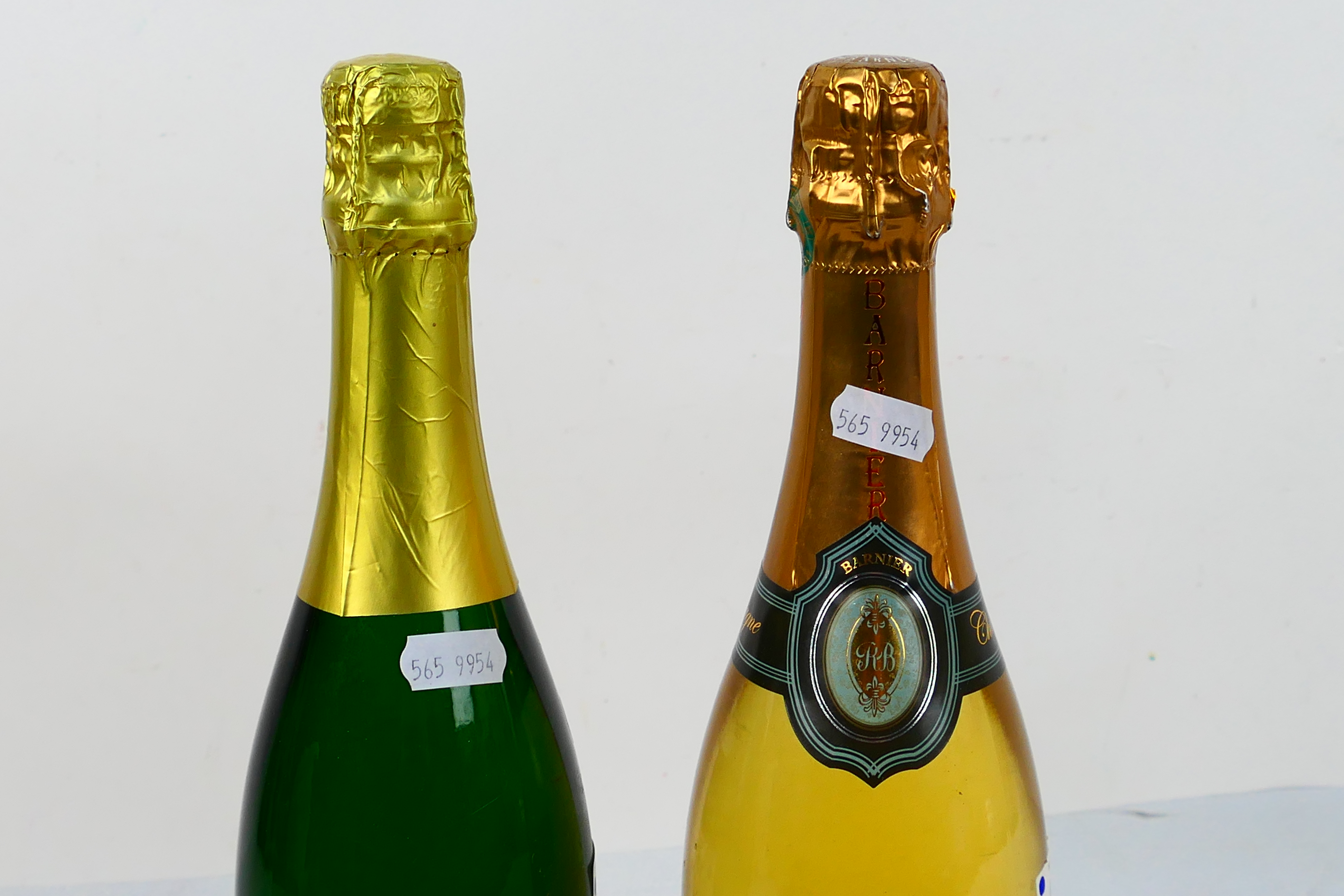 Two bottles of wine to include a 750ml bottle of Roger Barnier Curvee Demi-Sec Champagne. [2]. - Image 2 of 5