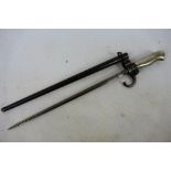 A French model 1886 bayonet with 34 cm (l) cruciform blade, with scabbard.