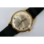 A gentleman's 9ct gold cased Eterna Matic wrist watch, retailed by Garrard, 3.