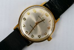 A gentleman's 9ct gold cased Eterna Matic wrist watch, retailed by Garrard, 3.