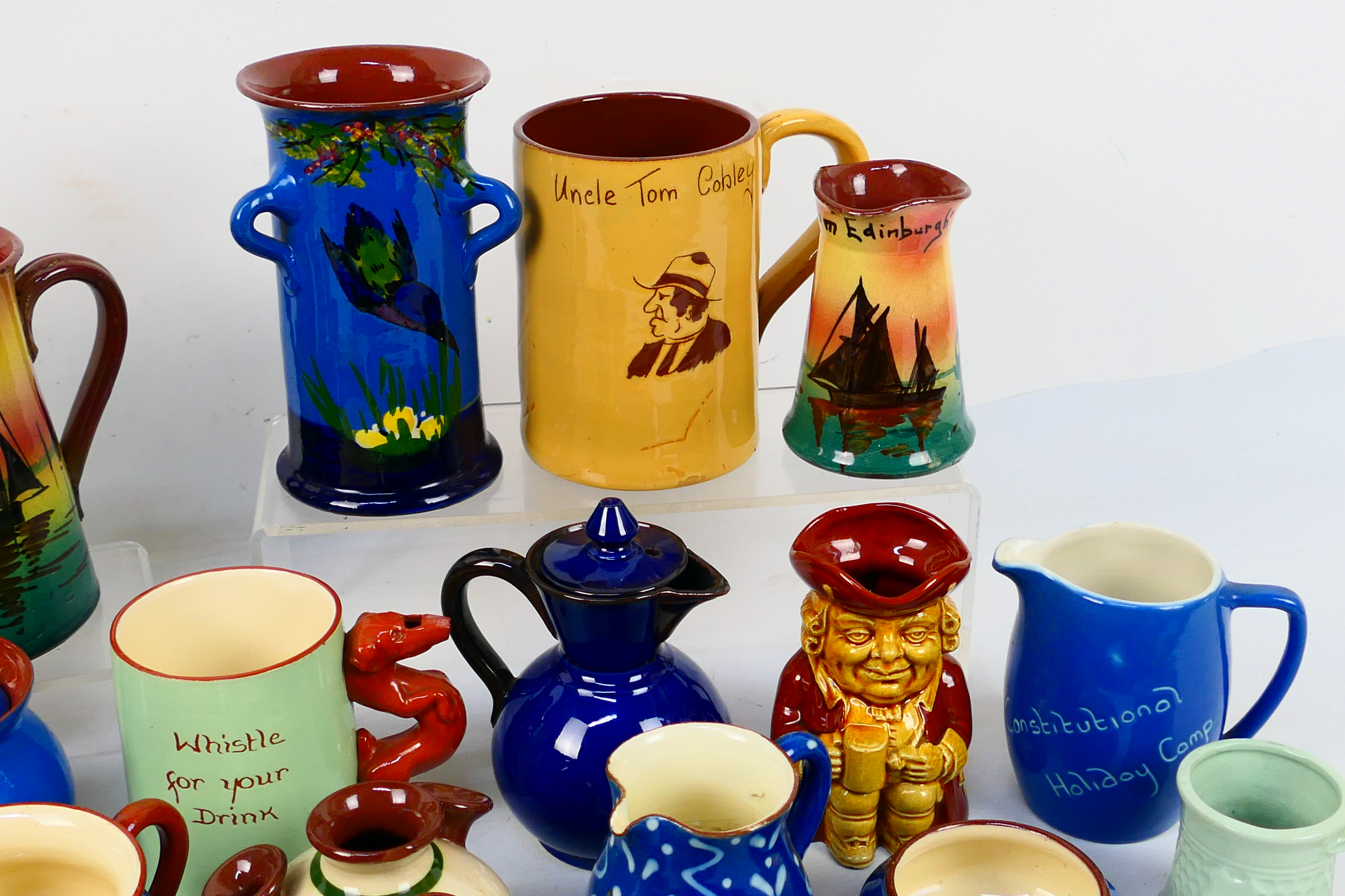 A collection of Torquay pottery wares to include bowls, jugs, cups and other, various manufacturers. - Image 11 of 20
