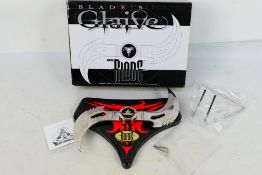 A boxed Marvel Blade replica weapon, Blade's Glaive, with wall mountable display stand.