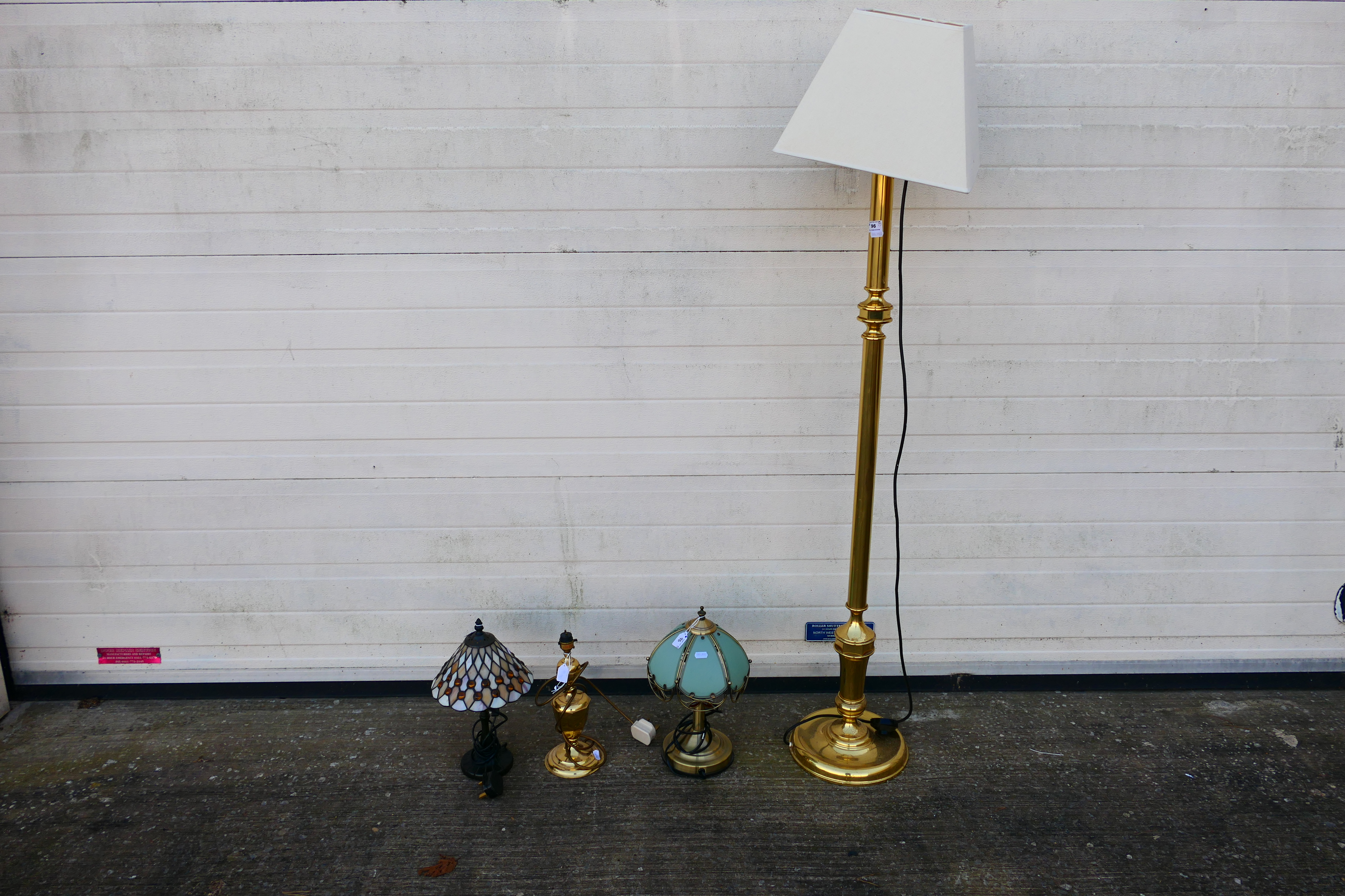 A brass standard lamp,