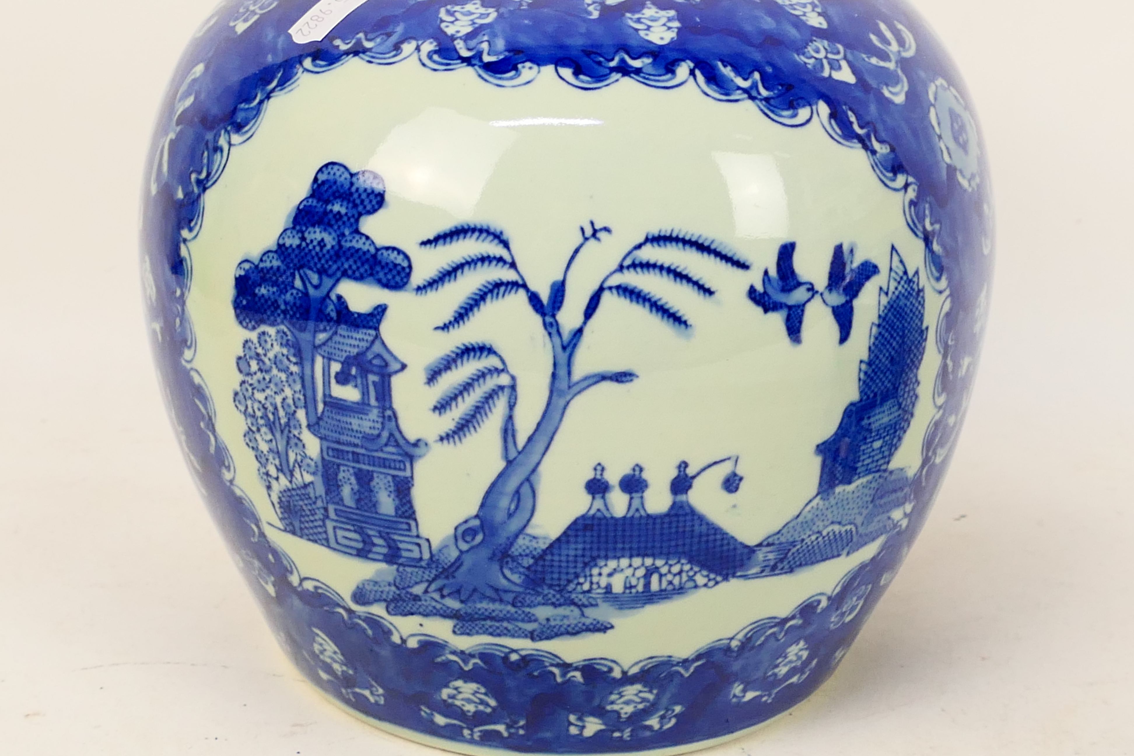 A blue and white vase of squat meiping form decorated with birds and flowers and a large blue and - Image 4 of 8