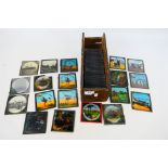 A collection of predominantly coloured glass slides with depictions of Arabian Nights,