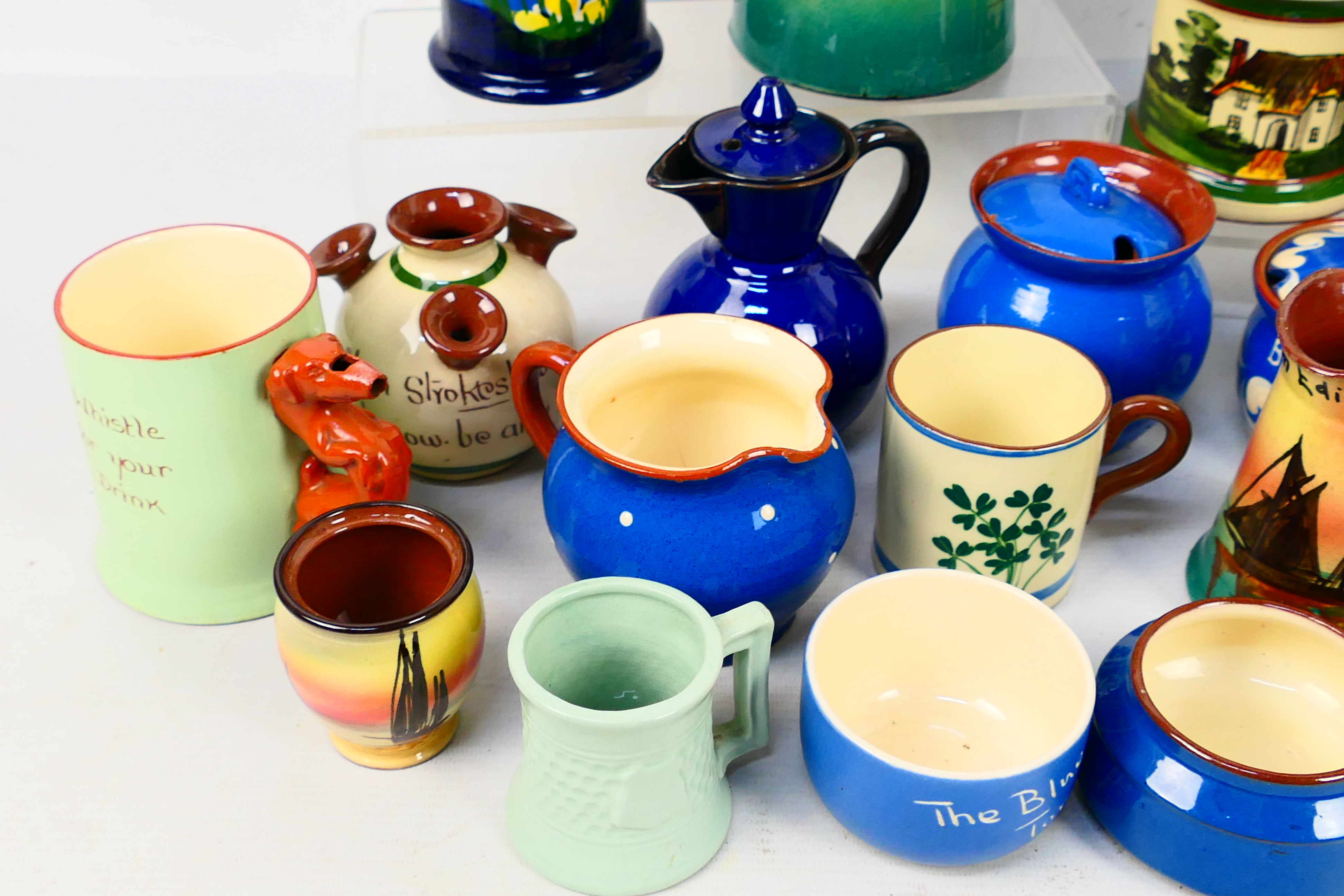 A collection of Torquay pottery wares to include bowls, jugs, cups and other, various manufacturers. - Image 3 of 20