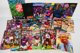 A collection of Aston Villa Football Club programmes and a ticket stub for the last game at the old